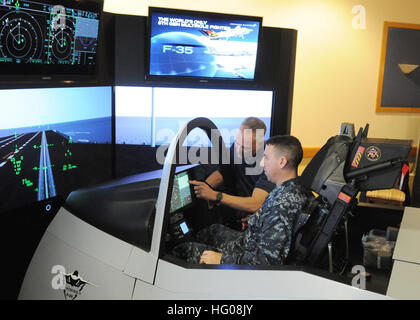 US Navy A contractor explains the differences between displays in a ...