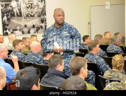 111115-N-ZO696-007 VIRGINIA BEACH, Va. (Nov. 15, 2011) Rear Adm. Kevin Scott delivers remarks at the second Operation Planning Team conference for Bold Alligator 2012 at Expeditionary Warfare Training Group Atlantic at Joint Expeditionary Base Little Creek/Fort Story. Bold Alligator represents the Navy and Marine Corps' revitalization of the fundamentals of amphibious operations, strengthening their traditional role as fighters from the sea. (U.S. Navy photo by Mass Communication Specialist 1st Class Phil Beaufort/Released) US Navy 111115-N-ZO696-007 Rear Adm. Kevin Scott delivers remarks at t Stock Photo