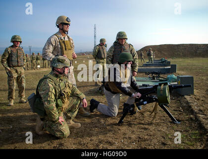 111119-N-AC887-002 KKRTSANISI, Georgia (Nov.19, 2011) Secretary of the Navy (SECNAV) the Honorable Ray Mabus fires an AGS-17, Russian 30mm automatic grenade launcher at the Krtsanisi Training Area weapons firing range. Mabus visited the facility to thank the Sailors and Marines providing support to the Georgian military and meet with senior government and military officials to discuss global maritime partnerships and security matters. (U.S. Navy photo by Chief Mass Communication Specialist Sam Shavers/Released) US Navy 111119-N-AC887-002 Secretary of the Navy (SECNAV) the Honorable Ray Mabus f Stock Photo