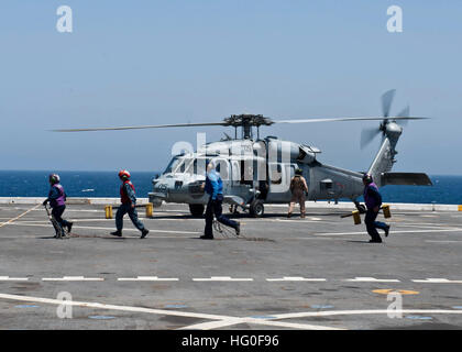 120516-N-XK513-104  RED SEA (May 16, 2012) An MH-60S Sea Hawk helicopter assigned to Helicopter Sea Combat Squadron (HSC) 22 prepares to take off from the amphibious transport dock ship USS New York (LPD 21). New York is part of the Iwo Jima Amphibious Ready Group with the embarked 24th Marine Expeditionary Unit. New York is deployed in support of maritime security operations and theater security cooperation efforts in the U.S. 5th Fleet area of responsibility. (U.S. Navy photo by Mass Communication Specialist 3rd Class Ian Carver/Released) USS New York action 120516-N-XK513-104 Stock Photo