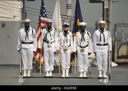 Sailors aboard the U.S. 7th Fleet flagship USS Blue Ridge (LCC 19) prepare to parade the colors as the ship arrives in Hakata, Japan. The visit is an outward demonstration of U.S. commitment to the defense of Japan and to maintaining peace and stability throughout the entire East Asia region. (U.S. Navy photo by Mass Communication Specialist 2nd Class Rafael Figueroa Medina) USS Blue Ridge arrives in Japan 120810-N-QI421-271 Stock Photo