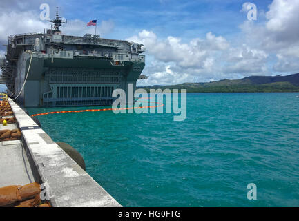 The forward-deployed amphibious assault ship USS Bonhomme Richard (LHD 6) is moored pierside at Naval Base Guam for a scheduled port visit. Bonhomme Richard, commanded by Capt. Daniel Dusek, is the lead ship of the only forward-deployed amphibious ready group and is currently operating in the 7th Fleet Area of Operations. (U.S. Navy photo by Mass Communication Specialist 2nd Class Michael Russell) USS Bonhomme Richard in Guam 120927-N-KB563-001