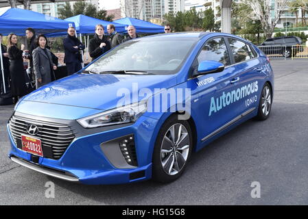 Las Vegas, Nevada, USA, 3rd January, 2017.  Hyundai showcases its Ioniq autonomous hybrid car concept as it navigates the Las Vegas streets as a part of the pre-CES media events.  CES, the world's largest annual consumer electronics trade show, runs from January 5-8 and is expected to feature 3,800 exhibitors showing off their latest services and products to more than 165,000 attendees representing more than 150 countries.  John D. Ivanko/Alamy Live News. Stock Photo