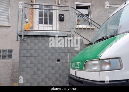 Lauterecken, Germany. 04th Jan, 2017. A police vehicle is parked outside a house where the police found more than 110 kilograms of pyrotechnic material during a search on 02 January 2017 in Lauterecken, Germany, 04 January 2017. Two detained men are being investigated on suspicion of violation of the explosives law and for preparing a severe criminal offence. According to the district attorney's office, they had planned an explosives attack in Kaiserslautern on New Year's Eve 2016. The explosives are to be recovered from the house on 08 January 2017. Photo: Harald Tittel/dpa/Alamy Live News Stock Photo