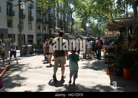 People walking on Las Ramblas, Barcelona Stock Photo