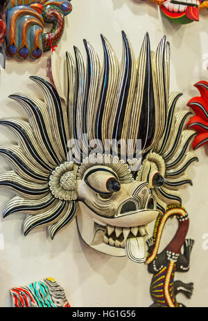 The fire dancer traditional black and white mask, important part of the Devils Dance Stock Photo