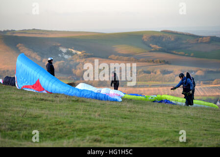 Paragliders setting up on the South Downs in East Sussex Stock Photo