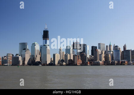 A view of Lower Manhattan in 2012 with the Freedom Tower under construction.  Photo taken in March, 2012. Stock Photo