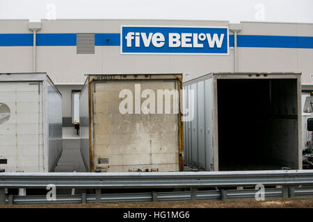 A logo sign outside of a facility occupied by Five Below in Pedricktown, New Jersey on December 11, 2016. Stock Photo