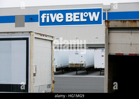 A logo sign outside of a facility occupied by Five Below in Pedricktown, New Jersey on December 11, 2016. Stock Photo