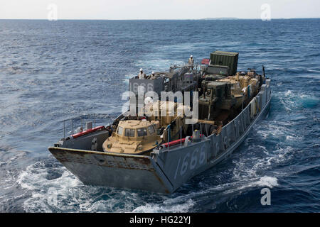 Landing Craft Utility (LCU) 1666, assigned to Naval Beach Unit (NBU) 7, prepares to embark the well deck of the amphibious dock landing ship USS Germantown (LSD 42) for exercise Keen Sword. Exercise Keen Sword is a bilateral field training exercise held biennially since 1986. The exercise is designed to increase the interoperability of U.S. Forces and the Japanese Self Defense Forces (JSDF) to effectively and mutually provide for the defense of Japan, or respond to a regional crisis or contingency situation in the Asia-Pacific region. Germantown is part of the Peleliu Amphibious Ready Group (# Stock Photo