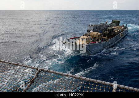 Landing Craft Utility (LCU) 1666, assigned to Naval Beach Unit (NBU) 7, prepares to embark the well deck of the amphibious dock landing ship USS Germantown (LSD 42) for exercise Keen Sword. Exercise Keen Sword is a bilateral field training exercise held biennially since 1986. The exercise is designed to increase the interoperability of U.S. Forces and the Japanese Self Defense Forces (JSDF) to effectively and mutually provide for the defense of Japan, or respond to a regional crisis or contingency situation in the Asia-Pacific region. Germantown is part of the Peleliu Amphibious Ready Group (# Stock Photo