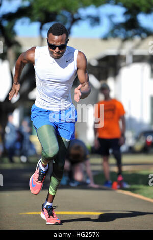 150309-N-WF272-068 PEARL HARBOR (March 9, 2015) Aviation Boatswain's Mate (Fuel) 3rd Class (retired) Donald Jackson participates in track and field practice during the 2015 Wounded Warrior Pacific Trials at Quick Field on Joint Base Pearl Harbor-Hickam (JBPHH). The trials allow wounded, ill and injured Sailors and Coast Guardsmen from across the country to compete in cycling, seated volleyball, swimming, track and field, and wheelchair basketball at JBPHH and other locations throughout the island. The top 40 athletes will be awarded a spot on Team Navy and advance to a competition among all br Stock Photo