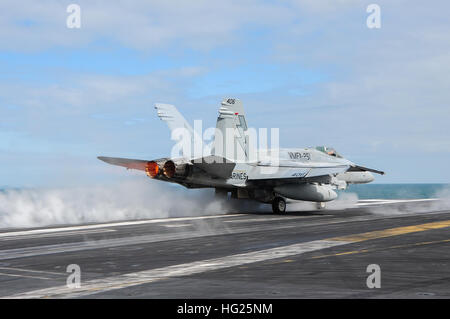 150322-N-ZF498-226 ATLANTIC OCEAN (March 22, 2015) An F/A-18C Hornet assigned to the “Thunderbolts” of Marine Strike Fighter Attack Squadron (VMFA) 251 launches from the flight deck of the Nimitz-class aircraft carrier USS Theodore Roosevelt (CVN 71) March 22, 2015. Theodore Roosevelt, homeported in Norfolk, is conducting naval operations in the U.S. 6th Fleet area of operations in support of U.S. national security interests in Europe. (U.S. Navy photo by Mass Communication Specialist 3rd Class Anthony N. Hilkowski/Released) USS Theodore Roosevelt operations 150322-N-ZF498-226 Stock Photo