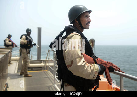 150422-N-RB579-097 ATLANTIC OCEAN (April 22, 2015) Mauritanian maritime forces conduct visit, board, search and seizure training aboard the Military Sealift Command's joint high-speed vessel USNS Spearhead (JHSV 1) in support of Exercise Saharan Express 2015, April 22. Saharan Express is a U.S. Africa Command-sponsored multinational maritime exercise designed to increase maritime safety and security in the waters of West Africa. (U.S. Navy photo by Mass Communication Specialist 1st Class Joshua Davies/Released) USNS Spearhead (JHSV-1) 150422-N-RB579-097 Stock Photo