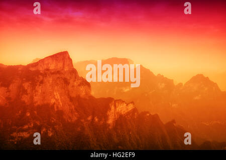 The mountains and rocky cliffs of tianmen or Tianmen shan near the city of  Zhangjiajie in Hunan province China. Stock Photo