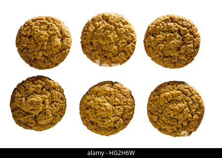 Top view of several oatmeal cookies isolated on white background. Stock Photo