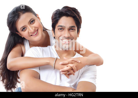 Portrait of a women hugging a men Stock Photo