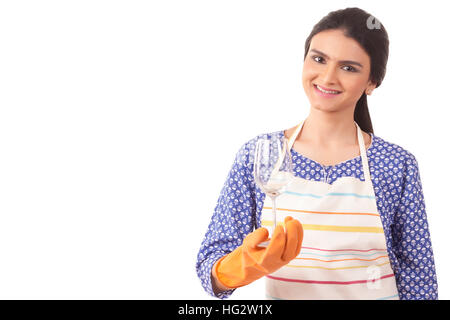 Young Woman Cleaning Wine Glass Stock Photo