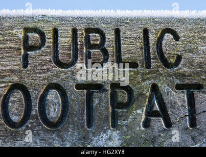 Wooden footpath sign on a frosty morning Stock Photo