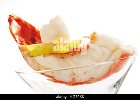 Half a boiled rock lobster garnished with star fruit (carambola) Stock Photo