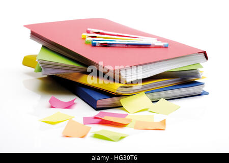 Folder, post-it notes and pens Stock Photo