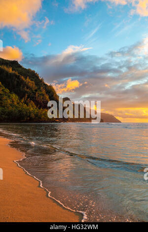 Kee Beach at sunset, with view of the Na Pali Coast on Kauai Stock Photo