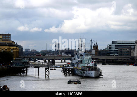 HMS Belfast museum ship originally Royal Navy light cruiser docked at Queen's walk London SE1 Stock Photo