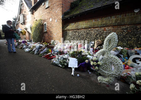 Floral tributes continue to be left outside the home of George Michael in Goring-on-Thames, Oxfordshire, after he died on Christmas Day aged 53. Stock Photo