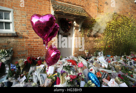 Floral tributes continue to be left outside the home of George Michael in Goring-on-Thames, Oxfordshire, after he died on Christmas Day aged 53. Stock Photo