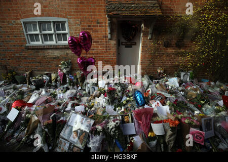 Floral tributes continue to be left outside the home of George Michael in Goring-on-Thames, Oxfordshire, after he died on Christmas Day aged 53. Stock Photo