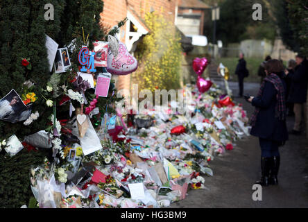 Floral tributes continue to be left outside the home of George Michael in Goring-on-Thames, Oxfordshire, after he died on Christmas Day aged 53. Stock Photo