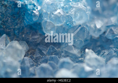 Agate is a cryptocrystalline variety of crystal quartz. Macro Texture aquamarine crystals. Stock Photo