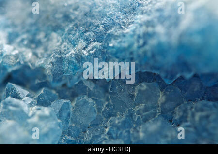 Agate is a cryptocrystalline variety of crystal quartz. Macro Texture aquamarine crystals. Stock Photo