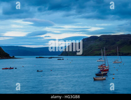 UK, Scotland, Highlands, Isle of Skye, Twilight view of the Loch Portree. Stock Photo