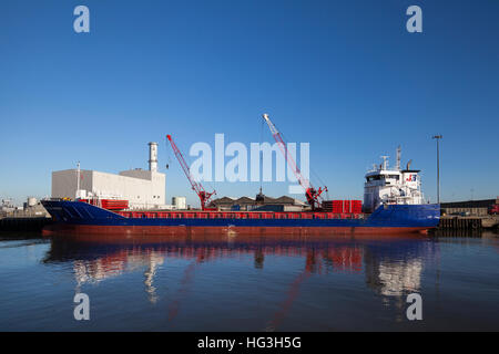 The Esprit cargo vessel off-loading aggregate at the Port of Great Yarmouth. Stock Photo