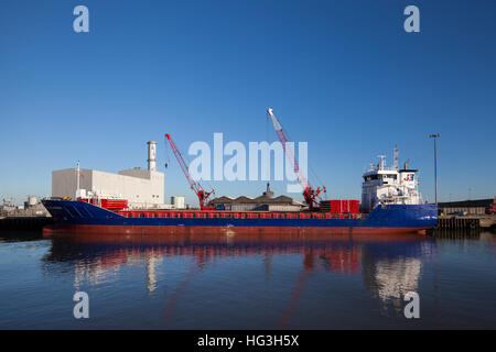 The Esprit cargo vessel off-loading aggregate at the Port of Great Yarmouth. Stock Photo