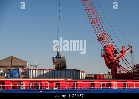 The Esprit cargo vessel off-loading aggregate at the Port of Great Yarmouth. Stock Photo