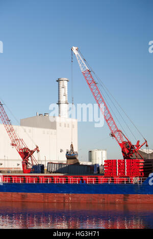 The Esprit cargo vessel off-loading aggregate at the Port of Great Yarmouth. Stock Photo