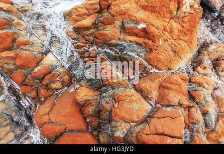 Closeup of a red stone texture background Stock Photo
