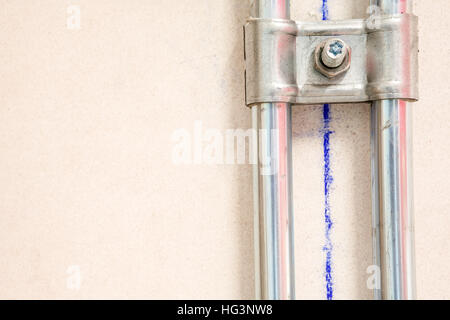 on the wall are the heating pipes already installed without radiator Stock Photo