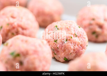 Preparing Raw Meatballs In Pan Stock Photo