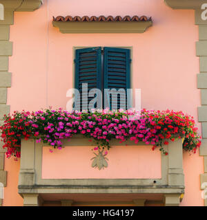 balcony at a colorful houses in Florence, Tuscany, Italy Stock Photo