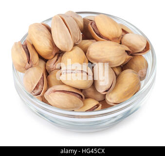 Pistachio nuts in glass bowl isolated on white background top view Stock Photo