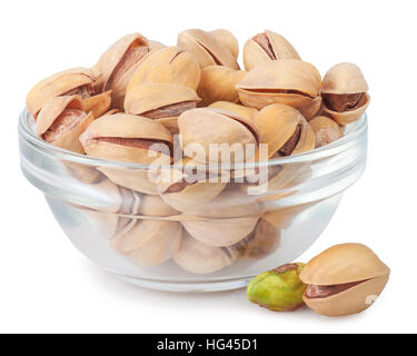 Pistachio nuts in glass bowl isolated on white background Stock Photo