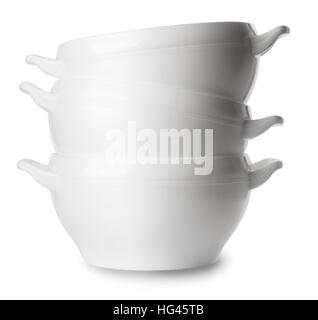 three white  empty porcelain soup plates stacked in pile isolated on white background Stock Photo