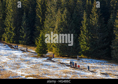 Tatra Mountains, Poland - January 30, 2016: Tourists strolling on a sunny day  in Tatra Mountains, Poland Stock Photo