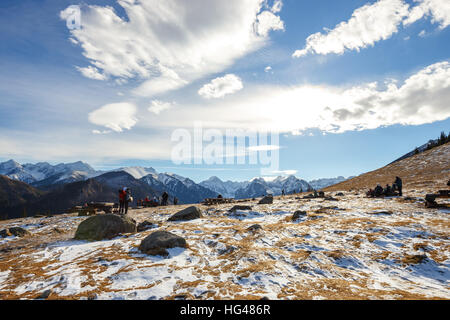 Tatra Mountains, Poland - January 30, 2016: Tourists strolling on a sunny day  in Tatra Mountains, Poland Stock Photo