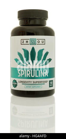 Winneconne, WI - 3 January 2017:  Bottle of Spirulina by Zhzou on an isolated background. Stock Photo