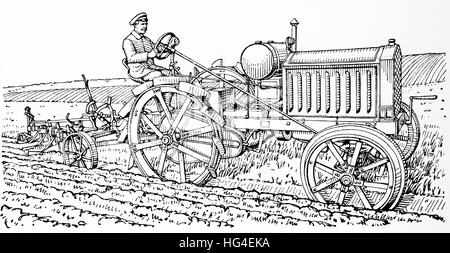 An early 20th century steam motorised tractor drawn furrow plough. From Meyers Lexicon, published 1924. Stock Photo